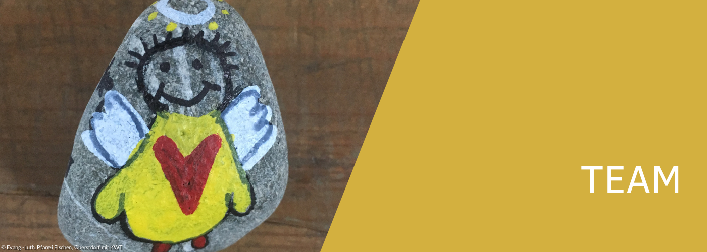 Stein mit kleinem Engel darauf